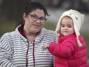 Melyssa Tootill is shown with her daughter Kimberly Lucier at their Windsor home on Thursday, December 16, 2021. The two-year-old who was infected with respiratory syncytial virus ended up on life support in Michigan for several weeks.