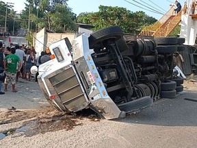An overturned truck is seen after a trailer crash in the southern Mexican state of Chiapas killed at least 49 people, most of them migrants from Central America, officials said on Thursday, in Tuxtla Gutierrez, Chiapas, Mexico December 9, 2021, in this picture obtained from social media.