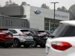 Brand new Ford vehicles are displayed on the sales lot at Serramonte Ford on January 05, 2022 in Colma, California. Ford announced a 17 percent drop in year-over-year sales in the month of December. Truck sales fell over 15 percent while SUV sales dropped 11 percent.