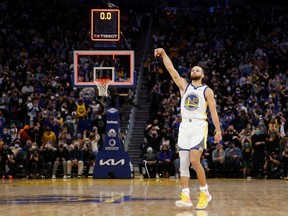 Stephen Curry #30 of the Golden State Warriors shoots the game-winning shot as time expires to defeat the Houston Rockets at Chase Center on January 21, 2022, in San Francisco, California.