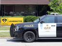 An OPP Leamington cruiser is parked at the headquarters on Clark Street West.