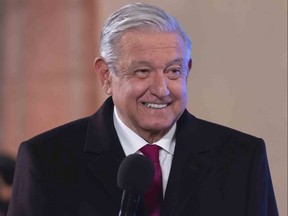 This handout picture released by the Mexican Presidency, shows Mexican President Andres Manuel Lopez Obrador during a press conference at the Palacio Nacional in Mexico City, on Jan. 10, 2022.