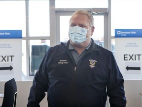 Ontario Premier Doug Ford arrives at a vaccine clinic for Purolator employees and their families at the company's plant in Toronto, Friday, Jan. 7, 2022. THE CANADIAN PRESS/Chris Young