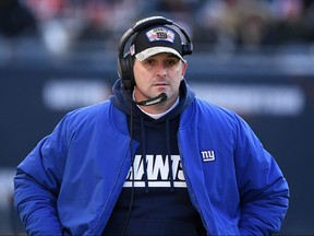 Head Coach Joe Judge of the New York Giants looks on during the fourth quarter of the game against the Chicago Bears at Soldier Field on Jan. 2, 2022 in Chicago.