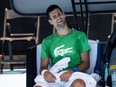 Novak Djokovic takes part in a practice session ahead of the Australian Open in Melbourne, Thursday, Jan. 13, 2022.