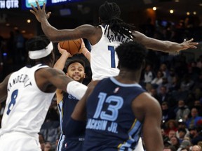 Memphis Grizzles guard Kyle Anderson (1) passes the ball during the second half against the Minnesota Timberwolves at FedExForum in Memphis, Tenn., Jan. 13, 2022.