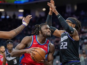 Detroit Pistons center Isaiah Stewart drive in against Sacramento Kings center Richaun Holmes during the first quarter at Golden 1 Center.