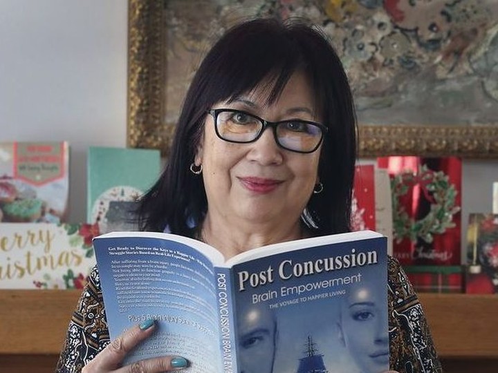  Betty Penny has written a book about her experiences recovering from a brain injury sustained in a 2014 car crash. She is shown at her Windsor home on Jan. 3, 2022.