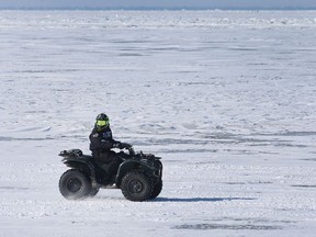 LAKESHORE, ONTARIO. JANUARY 28, 2022 -  An ATV rider is shown on Saturday, January 29, near the Belle River Marina on a bone chilling day.