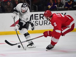 Defenceman Nick Leddy, at right, is seen in action for the Detroit Red Wings earlier this season against the Los Angeles Kings. He was traded to the St. Louis Blues on Monday.