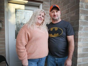 Tracy Kell (left) and her husband Joel Morris (right) at their home in Windsor on Jan. 14, 2022.