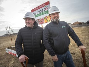 Co-owners of Mercato Fresh, Jonathan Reaume, left, and Marc Romualdi, pose for a photo marking the ground breaking of a new location on the 3500 block of Banwell Road, on Tuesday, January 18, 2022.