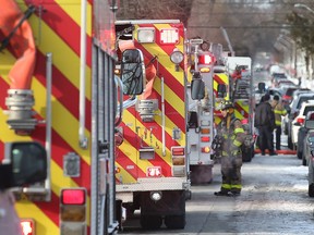 Firefighters are shown on the scene of a house fire in the 1200 block of Moy Avenue on Saturday, Jan. 29, 2022.