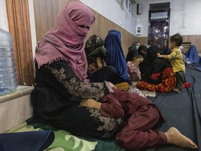 KABUL, AFGANISTAN - AUGUST 13 : Displaced Afghan women and children from Kunduz are seen at a mosque that is sheltering them on August 13, 2021 in Kabul, Afghanistan. Tensions are high as the Taliban advance on the capital city after taking Herat and the country's second-largest city Kandahar. (Photo by Paula Bronstein /Getty Images)