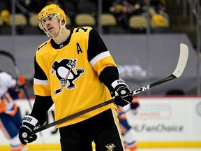 Evgeni Malkin of the Pittsburgh Penguins reacts after a goal by Jordan Eberle of the New York Islanders during the third period in Game Five of the First Round of the 2021 Stanley Cup Playoffs at PPG PAINTS Arena on May 24, 2021 in Pittsburgh, Pennsylvania.