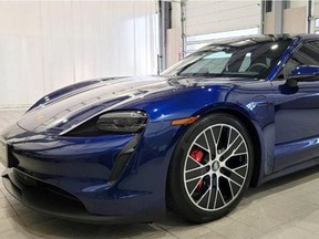 'Armed and dangerous.' Photo of a blue 2021 Porsche Taycan sports sedan that Windsor police say was stolen at gunpoint in the 600 block of Division Road shortly after noon on Feb. 3, 2022.