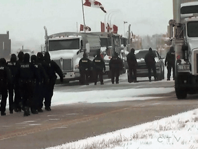 RCMP at the Coutts, Alberta, blockade of truckers and others protesting COVID-19 measures at Alberta's U.S. border crossing, February 1, 2022.