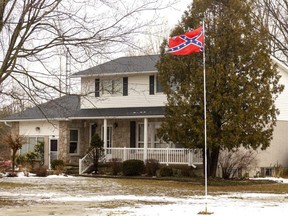 A Confederate flag is shown flying outside a home at 6067 Decker Dr. at London's southern outskirts on Thursday Feb. 17, 2022. (Mike Hensen/The London Free Press)