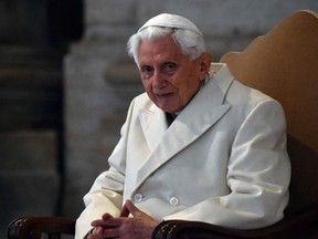 In this file photo taken Dec. 8, 2015, Pope Emeritus Benedict XVI is pictured at St Peter's basilica in The Vatican before the opening of the "Holy Door" by Pope Francis to mark the start of the Jubilee Year of Mercy.