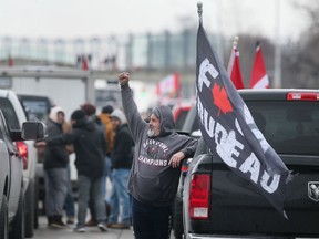 Anti-mandate protestors are shown along Huron Church Road southbound on Monday, February 7, 2022.