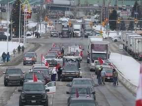 Anti-mandate protestors are shown along Huron Church Road southbound on Monday, February 7, 2022.