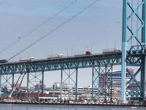 Trucks are shown on the Ambassador Bridge on Monday, Feb. 14, 2022.