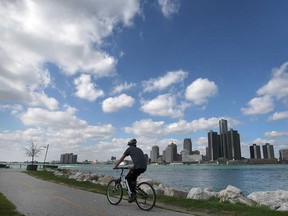A cyclist rides along Windsor's riverfront in this October 2021 file photo.