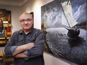 Local artist Dennis Smith is shown at his LaSalle home on Tuesday, February 22, 2022.