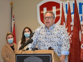 Unifor Local 444 president Dave Cassidy announces his bid for the presidency of Unifor, as his wife Jennifer, left, and daughter Mackenzie look on, Tuesday, Feb. 22, 2022, at the Local 444 union hall.