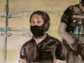 An artist's sketch shows Salah Abdeslam, one of the accused, who is widely-believed to be the only surviving member of the group suspected of carrying out the Paris' November 2015 attacks, on the first day of trial at the Paris courthouse on the Ile de la Cite in Paris, France, September 8, 2021.