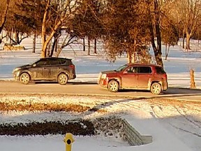 A surveillance camera image showing a red or burgundy GMC Terrain SUV that was involved in a hit-and-run incident on Road 4 East near Kingsville on Jan. 26, 2022.