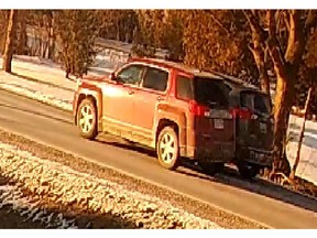 Ontario Provincial Police are looking for a red or burgundy GMC Terrain SUV that sideswiped a vehicle and ran it off the road in Kingsville on Jan. 26, 2022.
