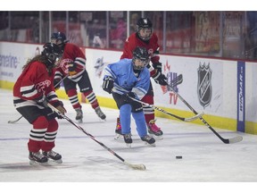 LaSalle Red team competes against Essex Light Blue in the U13 division of the 25th Annual Hockey for Hospice Tournament at the WFCU Centre, on Saturday, February 19, 2022.