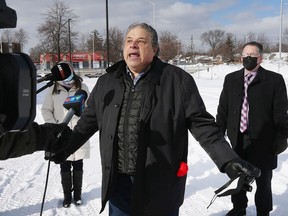 Jim Shaban, representing Westdell Corporation, which owns several plazas on Huron Church Road, speaks to reporters on Friday, February 18, 2021 near Huron Church Road and Tecumseh Road West where concrete barriers are blocking access to several businesses.