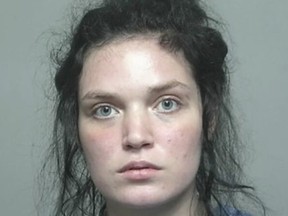 Mugshot of woman accused of killing her three-year-old daughter, claims SpongeBob made her do it.