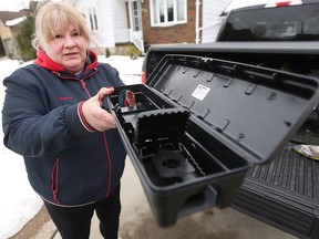 Catherine Trudell, owner of Windsor Pest Control, displays an Evo Station rat trap on Thursday, February 10, 2022.