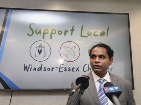 In this Oct. 13, 2021, file photo, Rakesh Naidu, CEO and president of the Windsor-Essex Regional Chamber of Commerce, is shown speaking to reporters in Tecumseh.