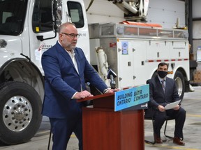 Ontario Energy Minister Todd Smith, left, speaks Thursday, Feb. 10, 2022, while John Avdoulos, president and CEO of Essex Powerlines looks on, during the unveiling of a new online tool that will allow Essex Power customers to track their energy use.