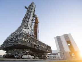 In this handout provided by the National Aeronautics and Space Administration (NASA), the Space Launch System (SLS) rocket with the Orion spacecraft aboard atop a mobile launcher as it rolls out of High Bay 3 of the Vehicle Assembly Building for the first time on its way to to Launch Complex 39B March 17, 2022 at Kennedy Space Center, Florida. Ahead of NASA's Artemis I flight test, the fully stacked and integrated SLS rocket and Orion spacecraft will undergo a wet dress rehearsal on the launch pad to verify systems and to practice countdown procedures for the first launch.