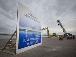 A large bill board with a drawing of the Gordie Howe International Bridge is seen at an event celebrating the official start of construction on the bridge, Friday, Oct. 5, 2018.