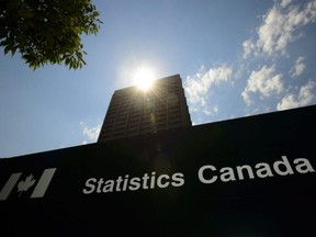 Statistics Canada building and signs are pictured in Ottawa, July 3, 2019.