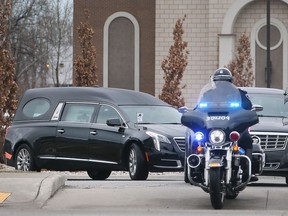 A hearse carrying Amanda Lyons leaves the Holy Cross Greek Orthodox Church in Windsor on Saturday, March 26, 2022. A well-attended funeral service was held for the 34 year-old LaSalle woman.