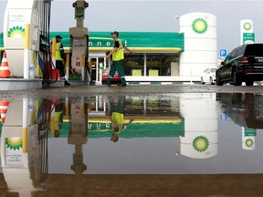 FILE PHOTO: A BP petrol station is reflected in a puddle in Moscow, Russia, July 4, 2016.