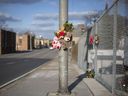 A memorial to Windsor cyclist Ken McEldowney, placed near the spot where he was fatally struck by a vehicle while riding his bicycle, is shown March 28, 2022.