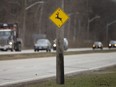 A deer crossing sign is seen on Ojibway Parkway on Thursday, March 31, 2022.
