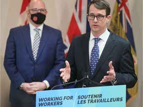 Job security for military reservists. Minister of Labour, Training and Skills Development Monte McNaughton, right, speaks during a press conference in Windsor on Friday, March 4, 2022, as Windsor Mayor Drew Dilkens looks on.