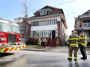 Windsor fire investigators at a residence in the 700 block of Pierre Avenue on March 14, 2022 - the day after a fire displaced five occupants.