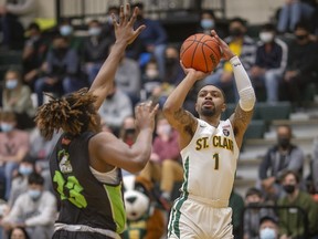 St. Clair's David Gomez Jr., seen in a game earlier this season, was thrilled with the team's silver-medal performance at the OCAA men's basketball championship.