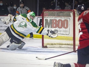 Belle River's Brett Brochu scrambles to make an incredible glove save on a shot by Windsor Spitfires' centre Ryan Abraham. Brochu was named OHL goaltender of the year on Thursday.