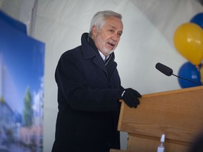 Tony Toldo gives remarks during a press event marking the naming of the new athletic centre p the Toldo Lancer Centre, outside the facility on Tuesday, March 29, 2022.